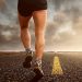 Gambe maschili che corrono su strada - L'arte di correre