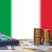 calcolatrice e soldi davanti a bandiera italiana