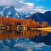 Alberi e montagne che si specchiano in un lago - Lago d'Arpy