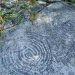 Incisione rupestre a forma di spirale - megaliti Mompantero