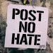 Manifesto con scritta Post no hate - Odio in rete