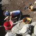 Persone che lavorano a scavo archeologico - progetto Orgères