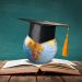 Libro, mappamondo e cappello laurea - riconoscimento titoli di studio esteri