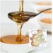 Miele che cola su cucchiaino e poi in tazza e cartina Piemonte